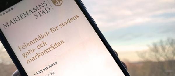 Bilden visar en mobil för felanmälan